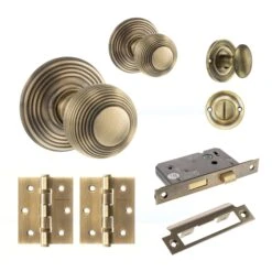 Ripon Round Reeded Mortice Bathroom Door Knob Set - Antique Brass (120423)