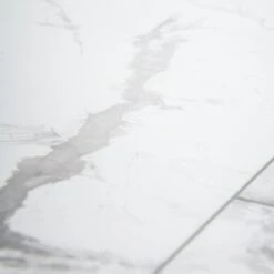 White Marble - Luxe Vision SPC 4mm UV Resistant Coating Wall Panelling (123046) 16 White Marble - Luxe Vision SPC 4mm UV Resistant Coating Wall Panelling (123046) -Oak Door Store SKU 345284 closeup2