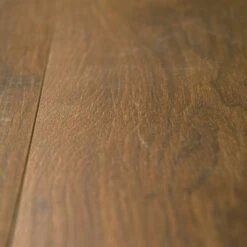 Iris Oak - 8mm Water Resistant Laminate Flooring (62002275) 9 Iris Oak - 8mm Water Resistant Laminate Flooring (62002275) -Oak Door Store SKU 5000006 closeup a470628e e627 46ba 9bf3 a00c8e08499a