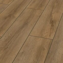 Grand Oak Brown - 12mm Water-Resistant Laminate Flooring (D90222) 7 Grand Oak Brown - 12mm Water-Resistant Laminate Flooring (D90222) -Oak Door Store SKU 500014 perspective cc6ebe6c 9141 4329 9996 ba11346a4689